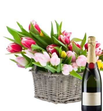 Basket of mixed tulips with sparkling wine
