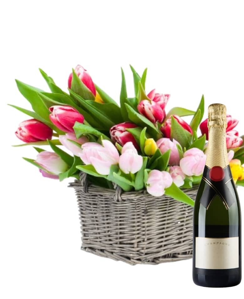 Basket of mixed tulips with sparkling wine
