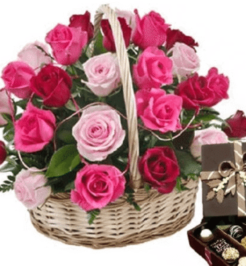 basket of 24 pink roses with chocolates