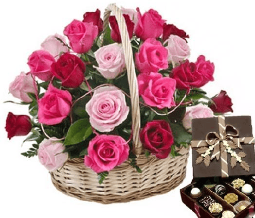 basket of 24 pink roses with chocolates